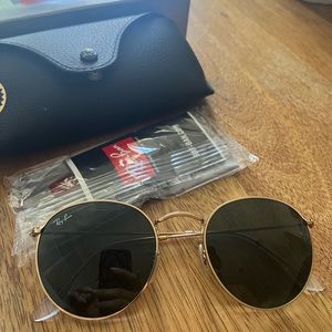 Brand new never User round Ray ban sunglasses